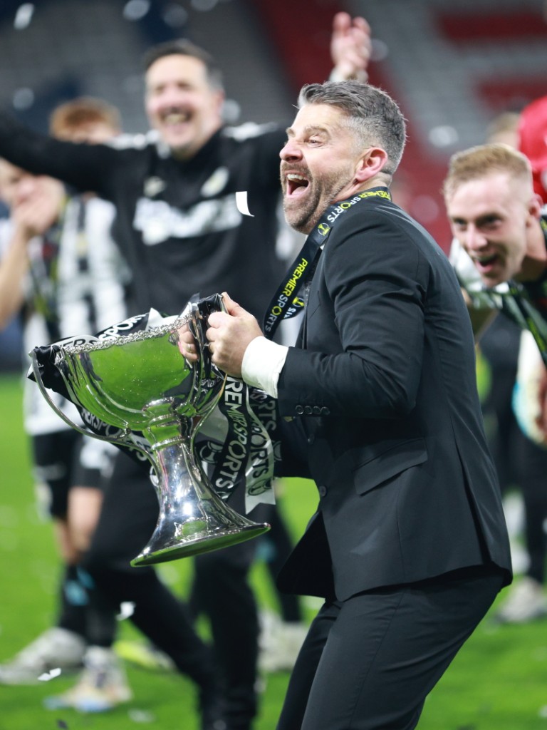 Stephen Robinson with the cup.