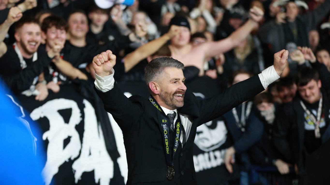 Stephen Robinson in front of fans.