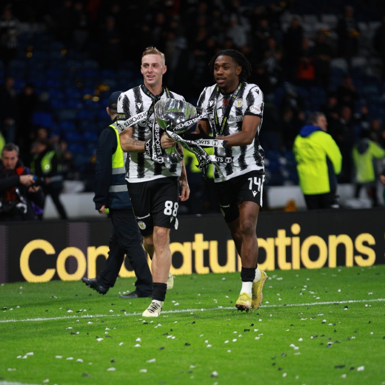 Killian Phillips and Dan Nlundulu with the cup.