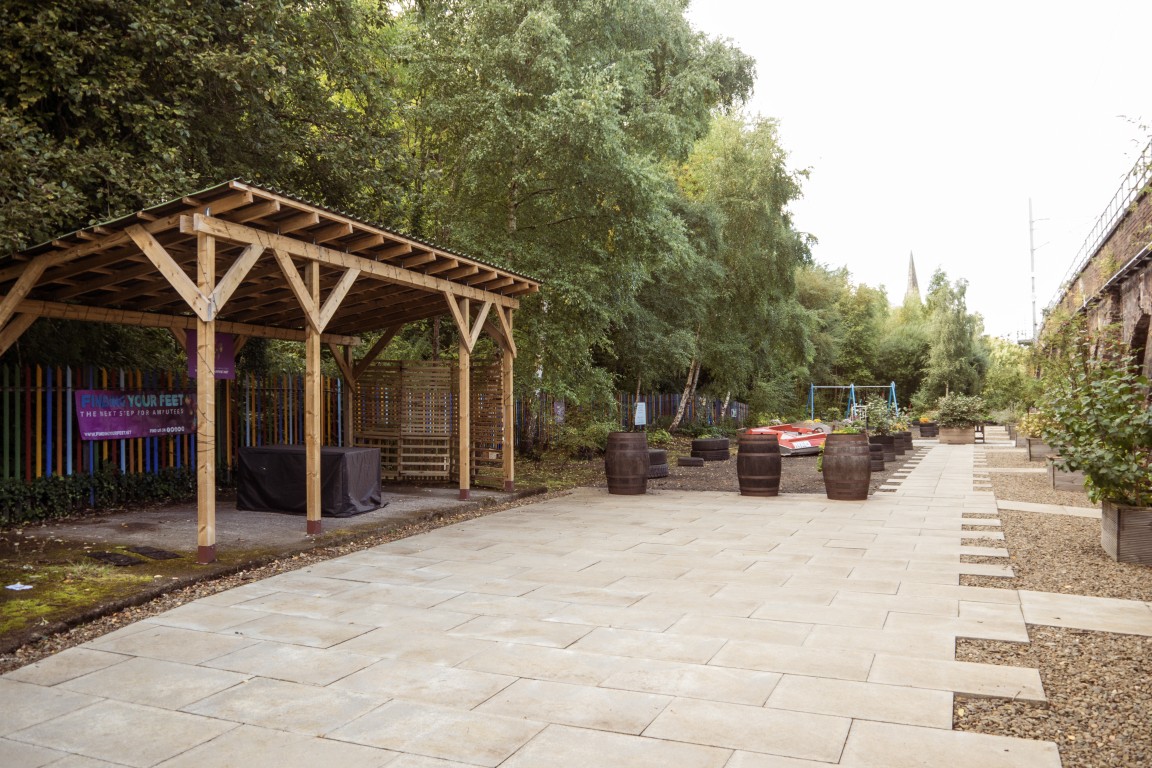 Covered seating area and path in the Finding Your Feet garden