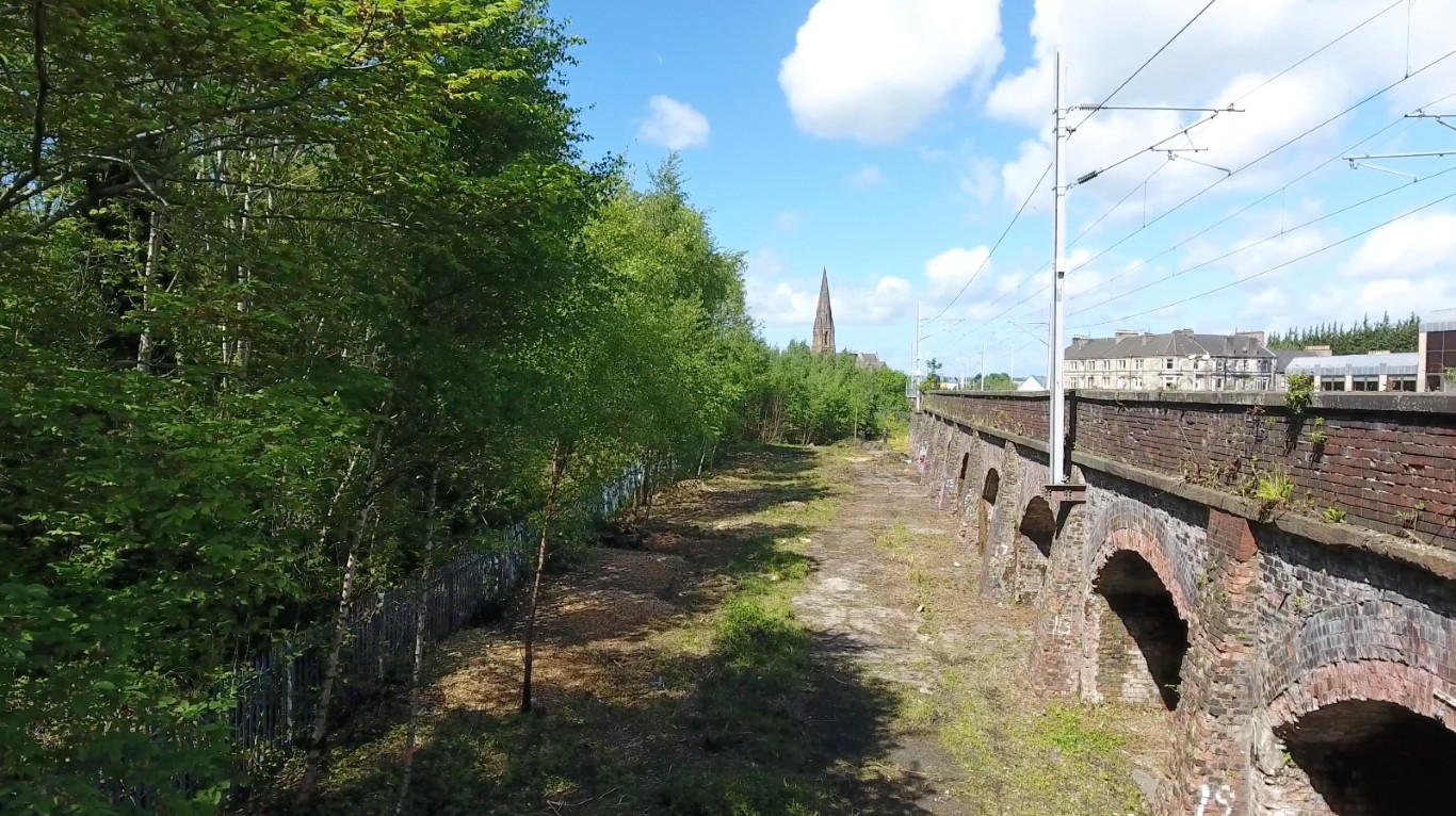 The space beneath the railway arches before it became a garden