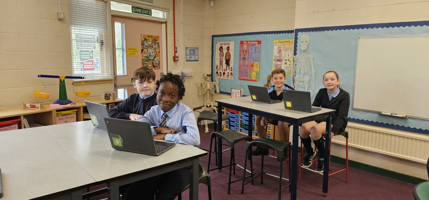 Pupils at St Anne's Primary School using digital technology