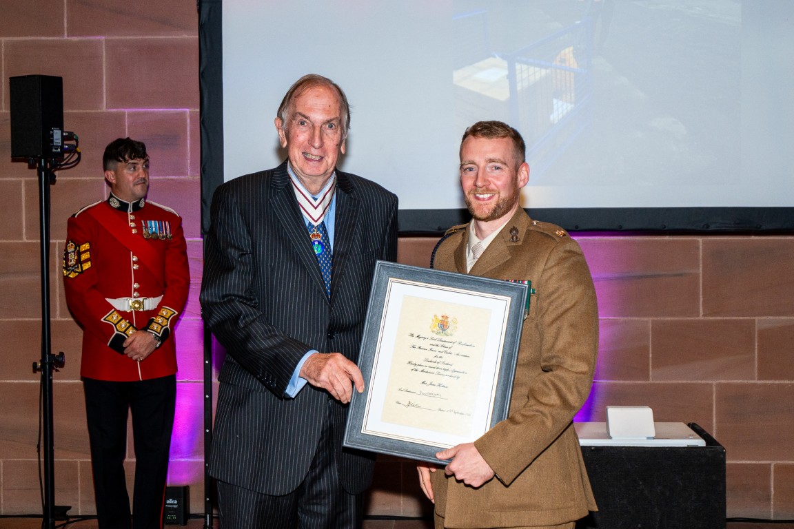 Major Martin Angus Borland collects Jean Holmes's certificate from Colonel Peter McCarthy