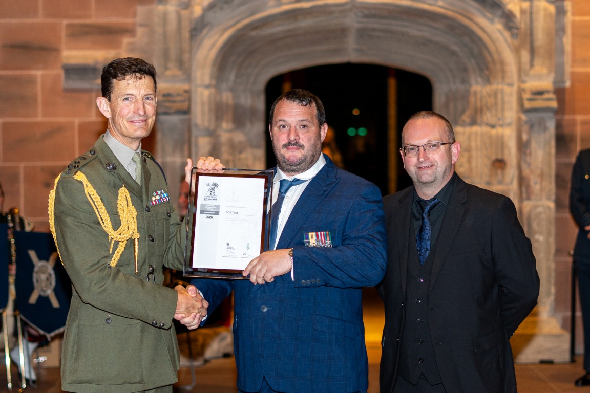 Andy Todd and Jamie Higgins collect RCA Trust's Silver Award from Brigadier Andy Muddiman