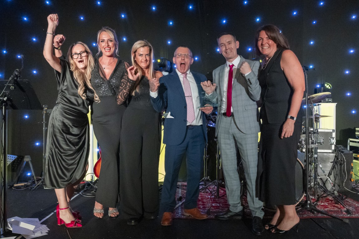 North East Recovery Community receiving the Lived Experience Recovery Organisation Award from Fiona McQueen
