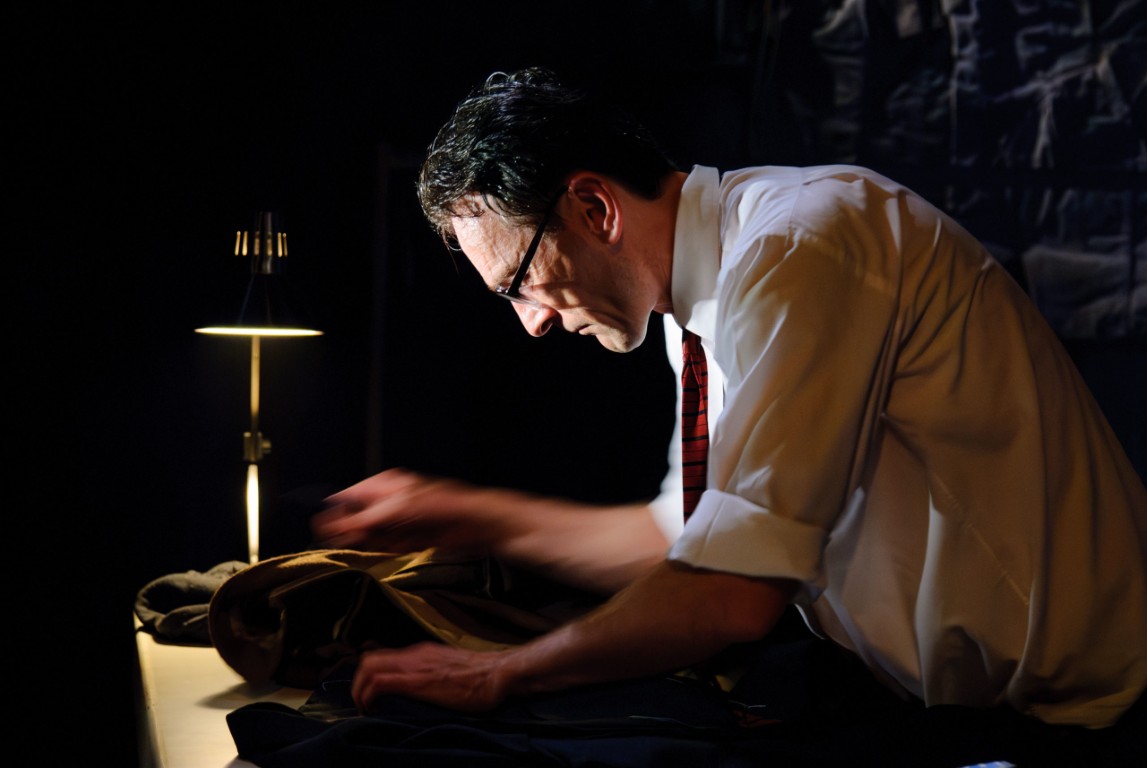 Matthew Zajac performing on stage in The Tailor of Inverness